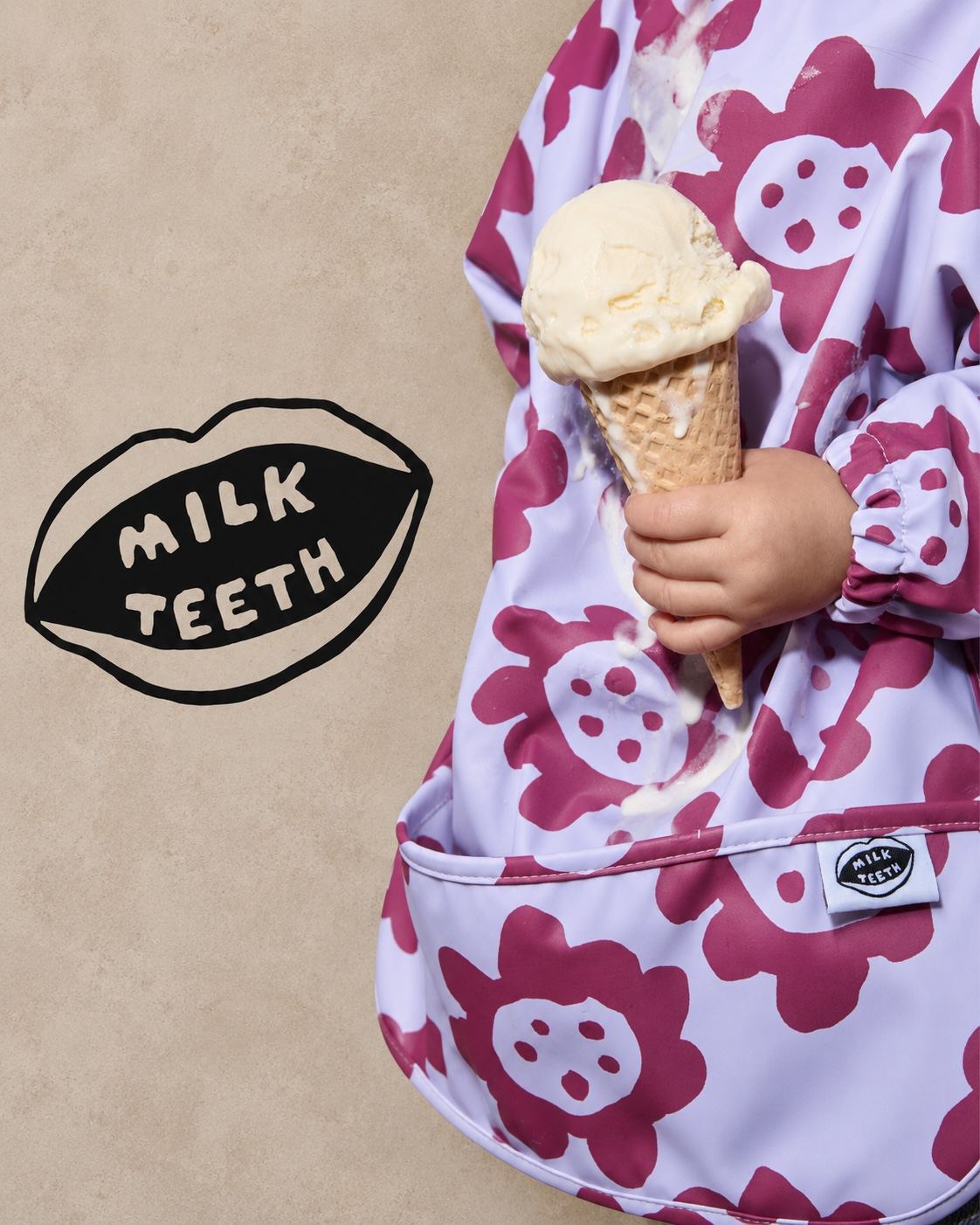 Milk Teeth logo and printed apron